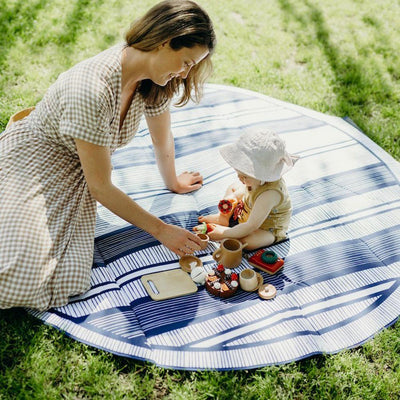The Love Rugs by Basil Bangs: versatile and spill-proof indoor-outdoor mats, perfect for the beach, picnics, and baby playtime.